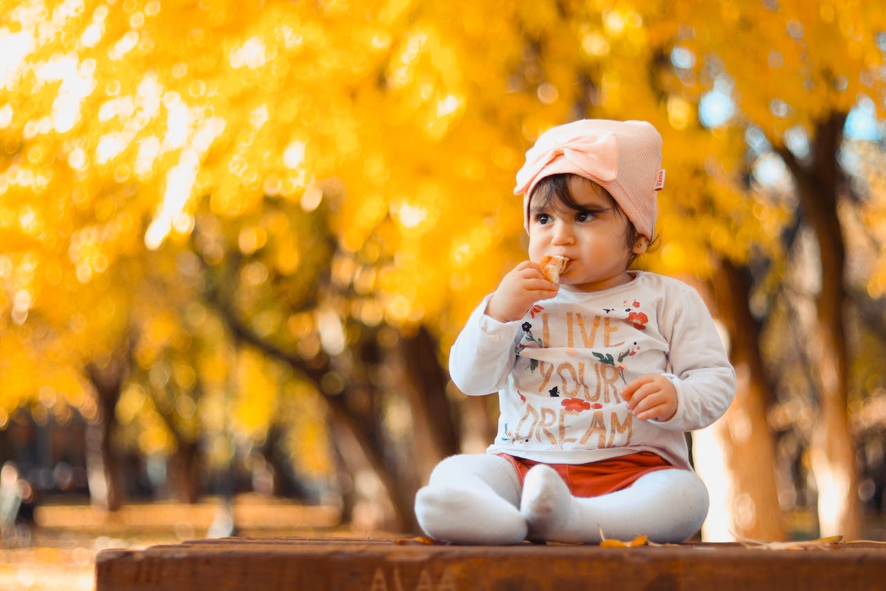 Baby in leaves