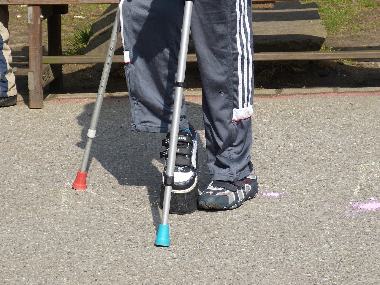 child with crutches